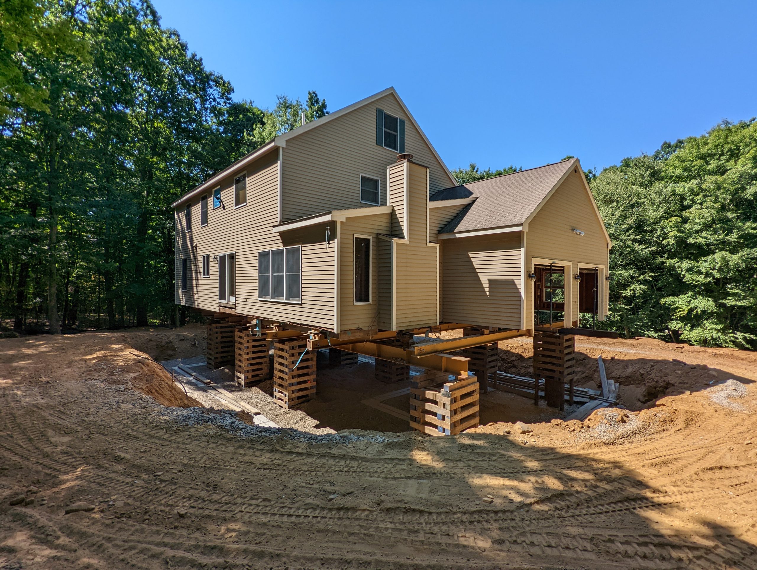PXL_20220820_151806173 House with chimney is lifted to replace foundation